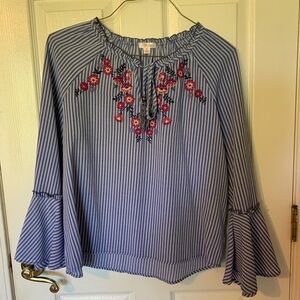 XHILARATION A blue and white striped top with floral details